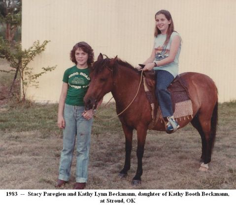 Stacy Paregien gives encouragement to her friend Kathy Lynn Beckmann (daughter of Kathy Booth Beckmann) who is on her horse Dolly. Photo taken in 1983 at our place north of Stroud, Okla., by Peggy Paregien